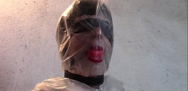 Tied Mistress suffers with a plastic bag on her head